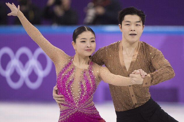 Maia Shibutani and Alex Shibutani of the United States perform their routine during the ice dance short program in the team figure skating event at the Pyeonchang Winter Olympics Sunday, February 11, 2018 in Gangneung, South Korea. (Paul Chiasson/The Canadian Press via AP)
