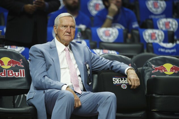 Jerry West sits on the bench before an NBA basketball game between the Los Angeles Clippers and the Phoenix Suns Saturday, Oct. 21, 2017, in Los Angeles. (AP Photo/Jae C. Hong)