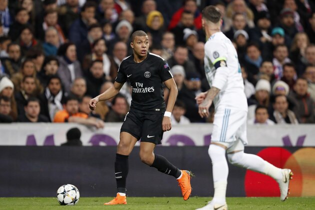 (L-R) Kylian Mbappe of Paris Saint-Germain, Sergio Ramos of Real Madrid during the UEFA Champions League round of 16 match between Real Madrid and Paris Saint-Germain at the Santiago Bernabeu stadium on February 14, 2018 in Madrid, Spain(Photo by VI Images via Getty Images)