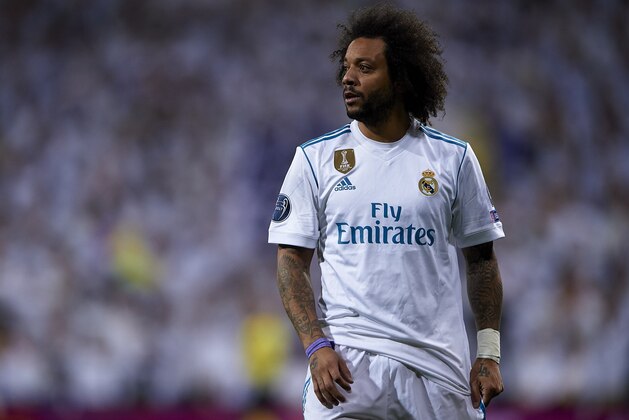MADRID, SPAIN - FEBRUARY 14:  Marcelo of Real Madrid looks on during the UEFA Champions League Round of 16 First Leg match between Real Madrid and Paris Saint-Germain at Bernabeu on February 14, 2018 in Madrid, Spain.  (Photo by Manuel Queimadelos Alonso/Getty Images)