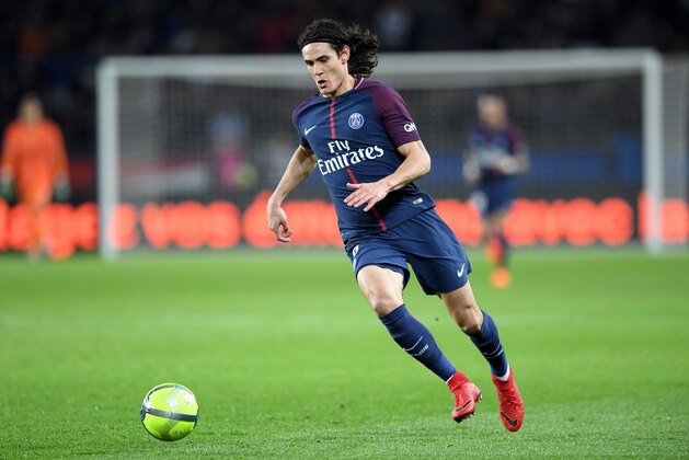 Paris Saint-Germain's Uruguayan forward Edinson Cavani controls the ball during the French Ligue 1 football match between Paris Saint-Germain (PSG) and Strasbourg at The Parc des Princes in Paris on February 17, 2018.  / AFP PHOTO / CHRISTOPHE ARCHAMBAULT        (Photo credit should read CHRISTOPHE ARCHAMBAULT/AFP/Getty Images)