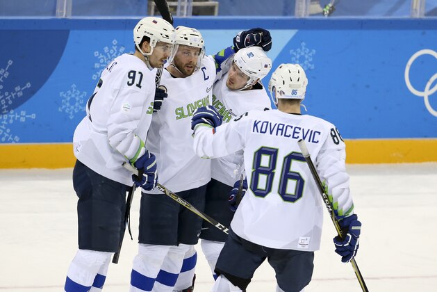 GANGNEUNG, SOUTH KOREA - FEBRUARY 16: Jan Mursak of Slovenia celebrates his goal with teammates during the Men's Ice Hockey Preliminary Round Group B game between Olympic Athletes from Russia and Slovenia at Gangneung Hockey Centre on February 16, 2018 in Gangneung, South Korea. (Photo by Jean Catuffe/Getty Images)