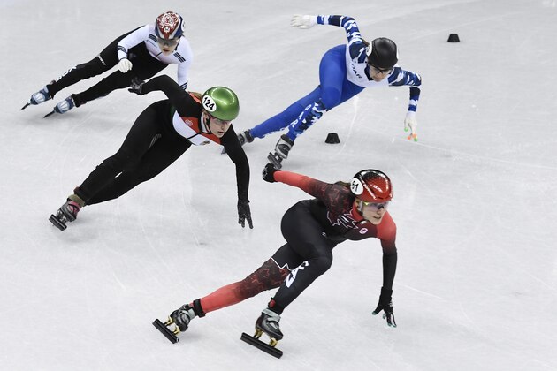 Canada's Kasandra Bradette (front) takes part in the women's 3,000m relay short track speed skating heat event during the Pyeongchang 2018 Winter Olympic Games, at the Gangneung Ice Arena in Gangneung on February 10, 2018. / AFP PHOTO / ARIS MESSINIS        (Photo credit should read ARIS MESSINIS/AFP/Getty Images)