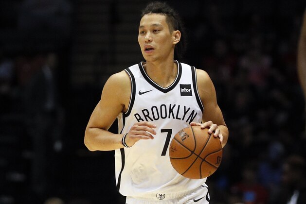 UNIONDALE, NY - OCTOBER 11:  Jeremy Lin #7 of the Brooklyn Nets moves the ball during a preseason NBA basketball game against the Philadelphia 76ers on October 11, 2017 at NYCB LIVE, home of the Nassau Veterans Memorial Coliseum in Uniondale, New York. Nets won 133-114. NOTE TO USER: User expressly acknowledges and agrees that, by downloading and/or using this Photograph, user is consenting to the terms and conditions of the Getty Images License Agreement.  (Photo by Paul Bereswill/Getty Images)