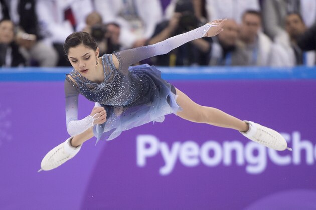Evgenia Medvedeva, Olympic Athletes of Russia, performs her routine during the women's short program in the team figure skating event at the Pyeonchang Winter Olympics Sunday, February 11, 2018 in Gangneung, South Korea. (Paul Chiasson/The Canadian Press via AP)