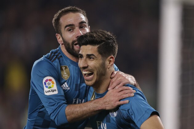 SEVILLA, SPAIN - FEBRUARY 18: Marco Asensio of Real Madrid celebrates 2-3 with Daniel Carvajal of Real Madrid during the La Liga Santander  match between Real Betis Sevilla v Real Madrid at the Estadio Benito Villamarin on February 18, 2018 in Sevilla Spain (Photo by Jeroen Meuwsen/Soccrates/Getty Images)