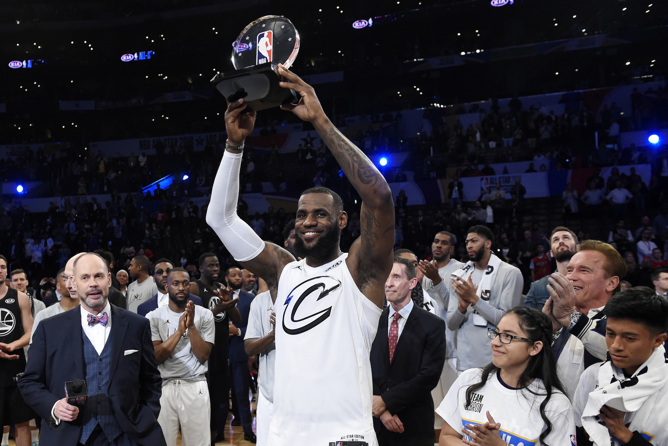 Team LeBron's LeBron James, of the Cleveland Cavaliers, holds the MVP trophy after his team defeated Team Stephen at the NBA All-Star basketball game, Sunday, Feb. 18, 2018, in Los Angeles. Team LeBron won 148-145. (AP Photo/Chris Pizzello)