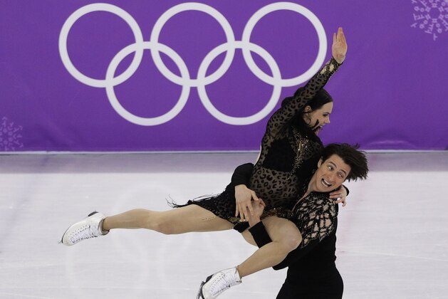 Tessa Virtue and Scott Moir of Canada perform during the ice dance, short dance figure skating in the Gangneung Ice Arena at the 2018 Winter Olympics in Gangneung, South Korea, Monday, Feb. 19, 2018. (AP Photo/David J. Phillip)