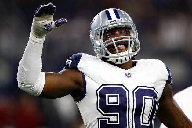 ARLINGTON, TX - NOVEMBER 30:  DeMarcus Lawrence #90 of the Dallas Cowboys reacts after a 38-14 win over the Washington Redskins at AT&T Stadium on November 30, 2017 in Arlington, Texas.  (Photo by Wesley Hitt/Getty Images)