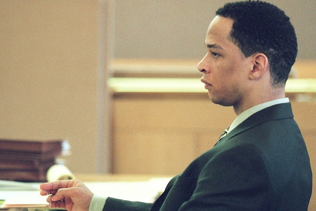 FILE - This Jan. 3, 2001, file photo shows former Carolina Panthers football player  Rae Carruth sitting at the defense table during his trial in Charlotte, N.C. Lawyers for  Carruth are asking a federal appeals court to reconsider his conviction for plotting to kill his pregnant girlfriend. A three-judge panel of the 4th U.S. Circuit Court of Appeals in Richmond, VA.,  will hear oral arguments in the case Tuesday, Oct. 26, 2010. (AP Photo/Jeff Siner, Pool, File)