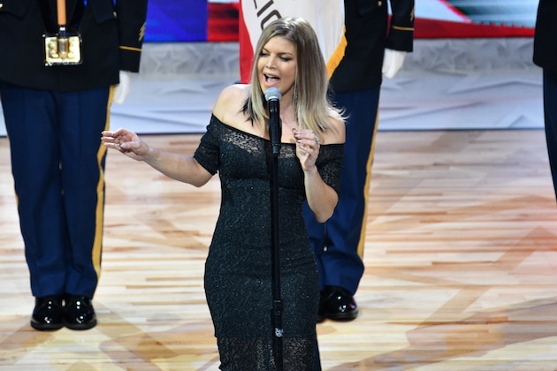 LOS ANGELES, CA - FEBRUARY 18:  Singer Fergie sings the national anthem prior to  The 67th NBA All-Star Game: Team LeBron Vs. Team Stephen at Staples Center on February 18, 2018 in Los Angeles, California.  (Photo by Allen Berezovsky/Getty Images)