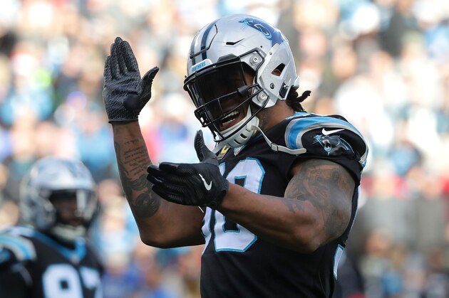 CHARLOTTE, NC - DECEMBER 24:  Julius Peppers #90 of the Carolina Panthers reacts after a play against the Tampa Bay Buccaneers during their game at Bank of America Stadium on December 24, 2017 in Charlotte, North Carolina.  (Photo by Streeter Lecka/Getty Images)