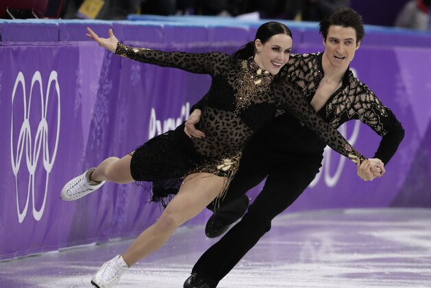 Tessa Virtue and Scott Moir of Canada perform during the ice dance, short dance figure skating in the Gangneung Ice Arena at the 2018 Winter Olympics in Gangneung, South Korea, Monday, Feb. 19, 2018. (AP Photo/Julie Jacobson)