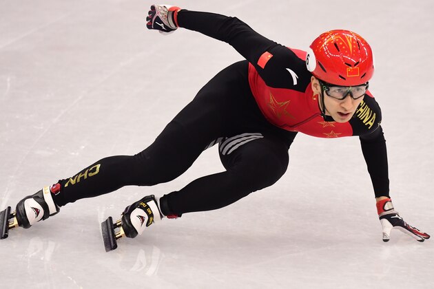 China's Wu Dajing competes in the men's 500m short track speed skating heat event during the Pyeongchang 2018 Winter Olympic Games, at the Gangneung Ice Arena in Gangneung on February 20, 2018. / AFP PHOTO / Roberto SCHMIDT        (Photo credit should read ROBERTO SCHMIDT/AFP/Getty Images)