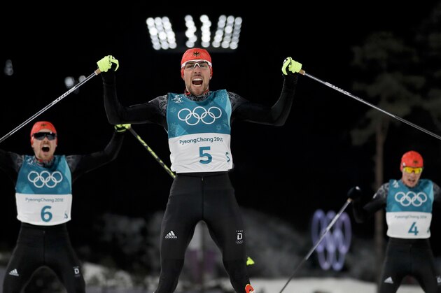 Johannes Rydzek, of Germany, celebrates after winning the gold medal in the men's 10km cross-country skiing competition during the nordic combined event at the 2018 Winter Olympics in Pyeongchang, South Korea, Tuesday, Feb. 20, 2018. (AP Photo/Kirsty Wigglesworth)