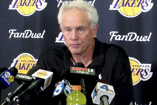 FILE - April 15, 2016 file photo Los Angeles Lakers general manager Mitch Kupchak speaks to reporters at team headquarters in El Segundo, Calif. The Los Angeles Lakers fired Kupchak Tuesday, Feb. 21, 2017, and put Magic Johnson in charge of basketball operations in a major shake-up of the struggling franchise's front office. (AP Photo/Greg Beacham, File)