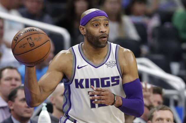 Sacramento Kings' Vince Carter looks to pass the ball against the Orlando Magic during the second half of an NBA basketball game, Tuesday, Jan. 23, 2018, in Orlando, Fla. Sacramento won 105-99. (AP Photo/John Raoux)
