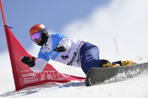 Russian snowboarder Vic Wild competes during the men's Parallel Giant Slalom PGS quarter finals at the FIS Snowboard and Freestyle Ski World Championships 2017 in Sierra Nevada on March 16, 2017. / AFP PHOTO / JAVIER SORIANO        (Photo credit should read JAVIER SORIANO/AFP/Getty Images)