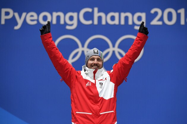 TOPSHOT - Austria's gold medallist Marcel Hirscher poses on the podium during the medal ceremony for the alpine skiing men's giant slalom at the Pyeongchang Medals Plaza during the Pyeongchang 2018 Winter Olympic Games in Pyeongchang on February 18, 2018. / AFP PHOTO / JAVIER SORIANO        (Photo credit should read JAVIER SORIANO/AFP/Getty Images)