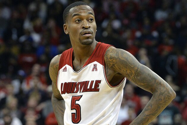 Louisville's Kevin Ware looks to the bench during the second half of their NCAA college basketball game Friday Nov. 29, 2013, in Louisville, Ky. Louisville defeated So. Mississippi 69-38. (AP Photo/Timothy D. Easley)