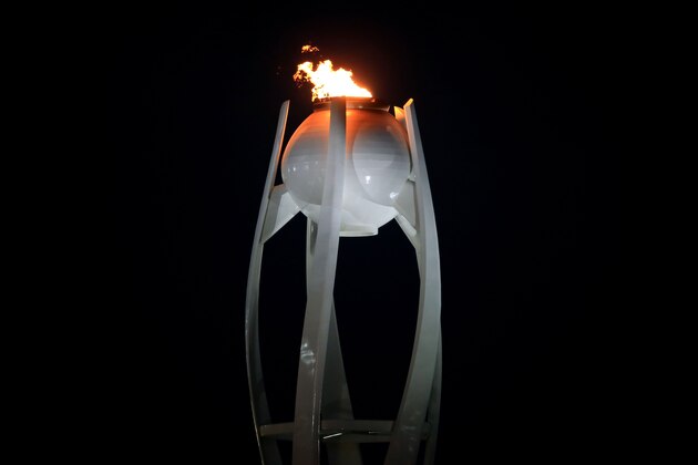 PYEONGCHANG-GUN, SOUTH KOREA - FEBRUARY 19:  The Olympic flame burns at Olympic Park on day 10 of the PyeongChang 2018 Winter Olympic Games on February 19, 2018 in Pyeongchang-gun, South Korea.  (Photo by Sean M. Haffey/Getty Images)