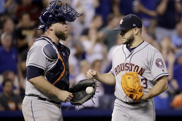 Houston Astros starting pitcher Lance McCullers Jr. talks to catcher Brian McCann after giving up the first hit of the baseball game by the Kansas City Royals, during the seventh inning Thursday, June 8, 2017, in Kansas City, Mo. (AP Photo/Charlie Riedel)