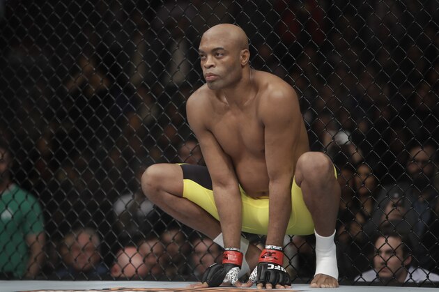 Anderson Silva, of Brazil, squats before a middleweight  mixed martial arts bout against Derek Brunson at UFC 208 Saturday, Feb. 11, 2017, in New York.  Silva won the fight. (AP Photo/Frank Franklin II)