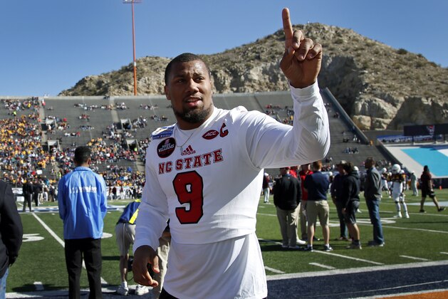 North Carolina State defensive end Bradley Chubb acknowledges the cheer of his fans before the start of the Sun Bowl NCAA college football game against Arizona State in El Paso, Texas, Friday, Dec. 29, 2017. (AP Photo/Andres Leighton)