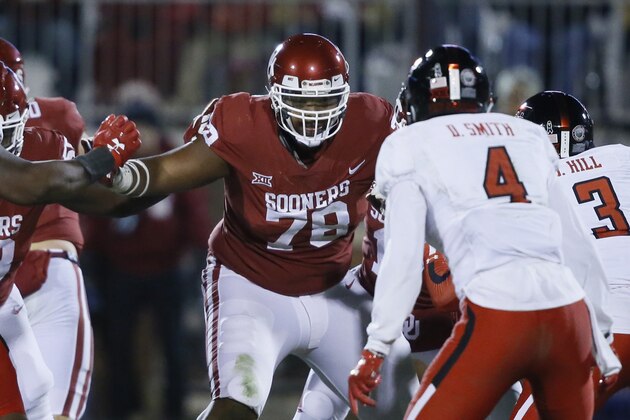 FILE - In this Oct. 28, 2017, file photo, Oklahoma offensive lineman Orlando Brown (78) blocks against Texas Tech during the second half of an NCAA college football game in Norman, Okla. Oklahoma left tackle Orlando Brown always wanted to be better than his dad. Orlando Sr., started 119 NFL games. Junior is on track to getting there he’s a first-team All-American who is expected to go in the first round of the NFL Draft if he leaves early.  (AP Photo/Sue Ogrocki, File)