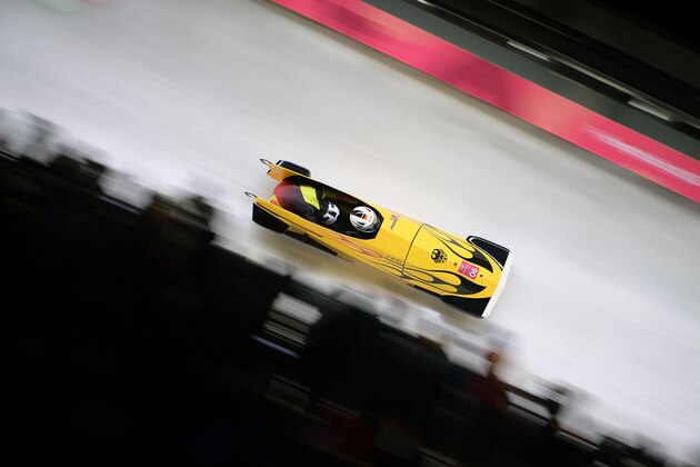 Germany's Mariama Jamanka and Germany's Lisa Buckwitz compete in the women's bobsleigh heat 3 run during the Pyeongchang 2018 Winter Olympic Games at the Olympic Sliding Centre on February 21, 2018 in Pyeongchang.  / AFP PHOTO / MOHD RASFAN        (Photo credit should read MOHD RASFAN/AFP/Getty Images)