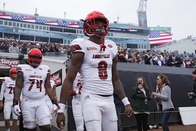 JACKSONVILLE, FL - DECEMBER 30: Lamar Jackson #8 of the Louisville Cardinals takes the field prior to the TaxSlayer Bowl against the Mississippi State Bulldogs at EverBank Field on December 30, 2017 in Jacksonville, Florida. (Photo by Joe Robbins/Getty Images)