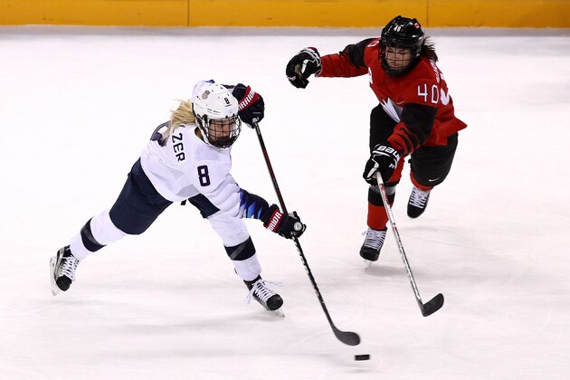 GANGNEUNG, SOUTH KOREA - FEBRUARY 15: Emily Pfalzer #8 of the United States shoots against Blayre Turnbull #40 of Canada during the Women's Ice Hockey Preliminary Round Group A game on day six of the PyeongChang 2018 Winter Olympic Games at Kwandong Hockey Centre on February 15, 2018 in Gangneung, South Korea.  (Photo by Maddie Meyer/Getty Images)