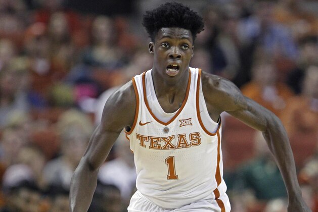 FILE - In this March 4, 2017, file photo, Texas guard Andrew Jones dribbles the ball during the second half of an NCAA college basketball game against Baylor, in Austin, Texas. Texas announced, Wednesday, Jan. 10, 2018, that sophomore guard Andrew Jones has leukemia and has started treatment. Jones was the Longhorns leading scorer before he was sidelined by a broken wrist. He played sparingly in his return after complaining of low energy and was sent for tests. (AP Photo/Michael Thomas, File)