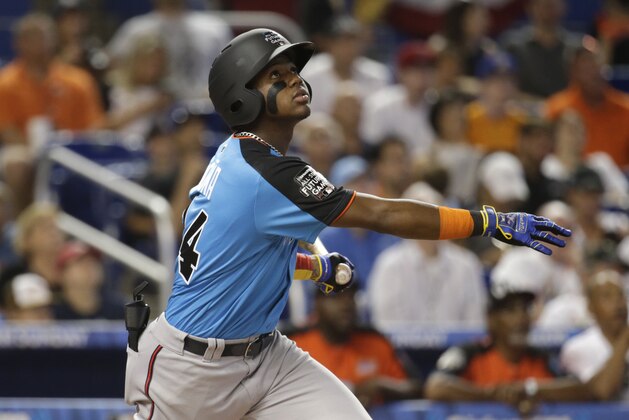 Atlanta Braves and the World Team's Ronald Acuna flies out during the second inning of the All-Star Futures baseball game against the U.S. Team, Sunday, July 9, 2017, in Miami. (AP Photo/Lynne Sladky)