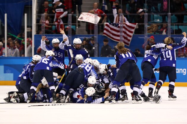GANGNEUNG, SOUTH KOREA - FEBRUARY 22:  The United States celebrates after defeating Canada in a shootout to win the Women's Gold Medal Game on day thirteen of the PyeongChang 2018 Winter Olympic Games at Gangneung Hockey Centre on February 22, 2018 in Gangneung, South Korea.  (Photo by Jamie Squire/Getty Images)