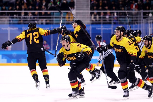 GANGNEUNG, SOUTH KOREA - FEBRUARY 21: Dominik Kahun #72, Frank Mauer #28 and Matthias Plachta #22 of Germany celebrate after defeating Sweden 4-3 during the Men's Play-offs Quarterfinals game on day twelve of the PyeongChang 2018 Winter Olympic Games at Kwandong Hockey Centre on February 21, 2018 in Gangneung, South Korea. (Photo by Maddie Meyer/Getty Images)