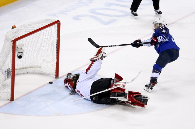 GANGNEUNG, SOUTH KOREA - FEBRUARY 22: Jocelyne Lamoureux-Davidson of USA scores against goalkeeper of Canada Shannon Szabados the game winning goal penalty during the Women's Ice Hockey Gold Medal game final between USA and Canada on day thirteen of the PyeongChang 2018 Winter Olympic Games at Gangneung Hockey Centre on February 22, 2018 in Gangneung, South Korea. (Photo by Jean Catuffe/Getty Images)