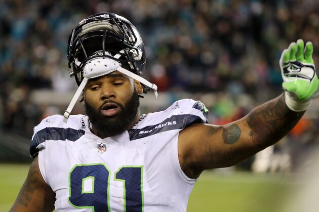 JACKSONVILLE, FL - DECEMBER 10:  Sheldon Richardson #91 of the Seattle Seahawks walks off the field during the second half of their game against the Jacksonville Jaguars at EverBank Field on December 10, 2017 in Jacksonville, Florida.  (Photo by Sam Greenwood/Getty Images)
