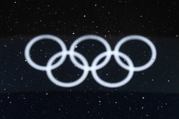 PYEONGCHANG-GUN, SOUTH KOREA - FEBRUARY 22:  The Olympic rings are seen during snowfall during the medal ceremony on day 13 of the PyeongChang 2018 Winter Olympic Games at Medal Plaza on February 22, 2018 in Pyeongchang-gun, South Korea.  (Photo by Clive Rose/Getty Images)
