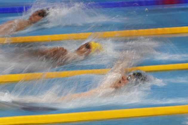 United States' Ryan Murphy, China's Xu Jiayu and Russia's Evgeny Rylov, from right, compete in the men's 200-meter backstroke final during the swimming competitions of the World Aquatics Championships in Budapest, Hungary, Friday, July 28, 2017. (AP Photo/Petr David Josek)