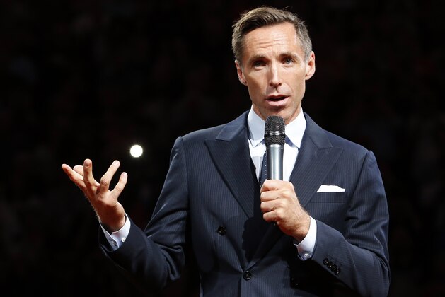 Two-time NBA most valuable player Steve Nash is introduced into the Suns Ring of Fire at halftime of an NBA basketball game between the Phoenix Suns and the Portland Trail Blazers, Friday, Oct. 30, 2015, in Phoenix. (AP Photo/Rick Scuteri)