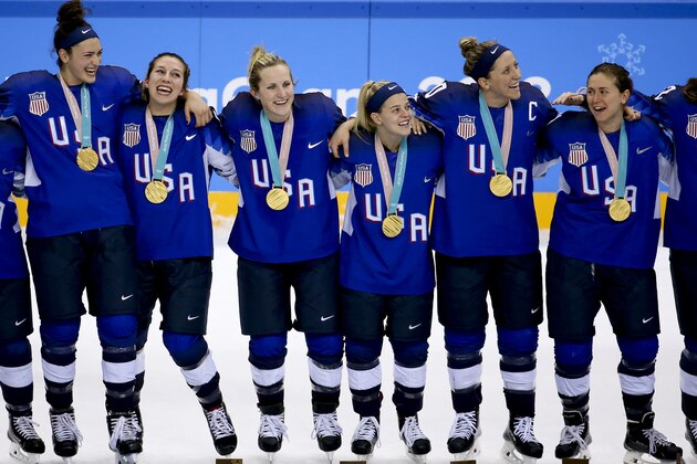 GANGNEUNG, SOUTH KOREA - FEBRUARY 22: Players of Team USA celebrate winning the gold medal after penalty-shot shootout following the Women's Ice Hockey Gold Medal game final between USA and Canada on day thirteen of the PyeongChang 2018 Winter Olympic Games at Gangneung Hockey Centre on February 22, 2018 in Gangneung, South Korea. (Photo by Jean Catuffe/Getty Images)