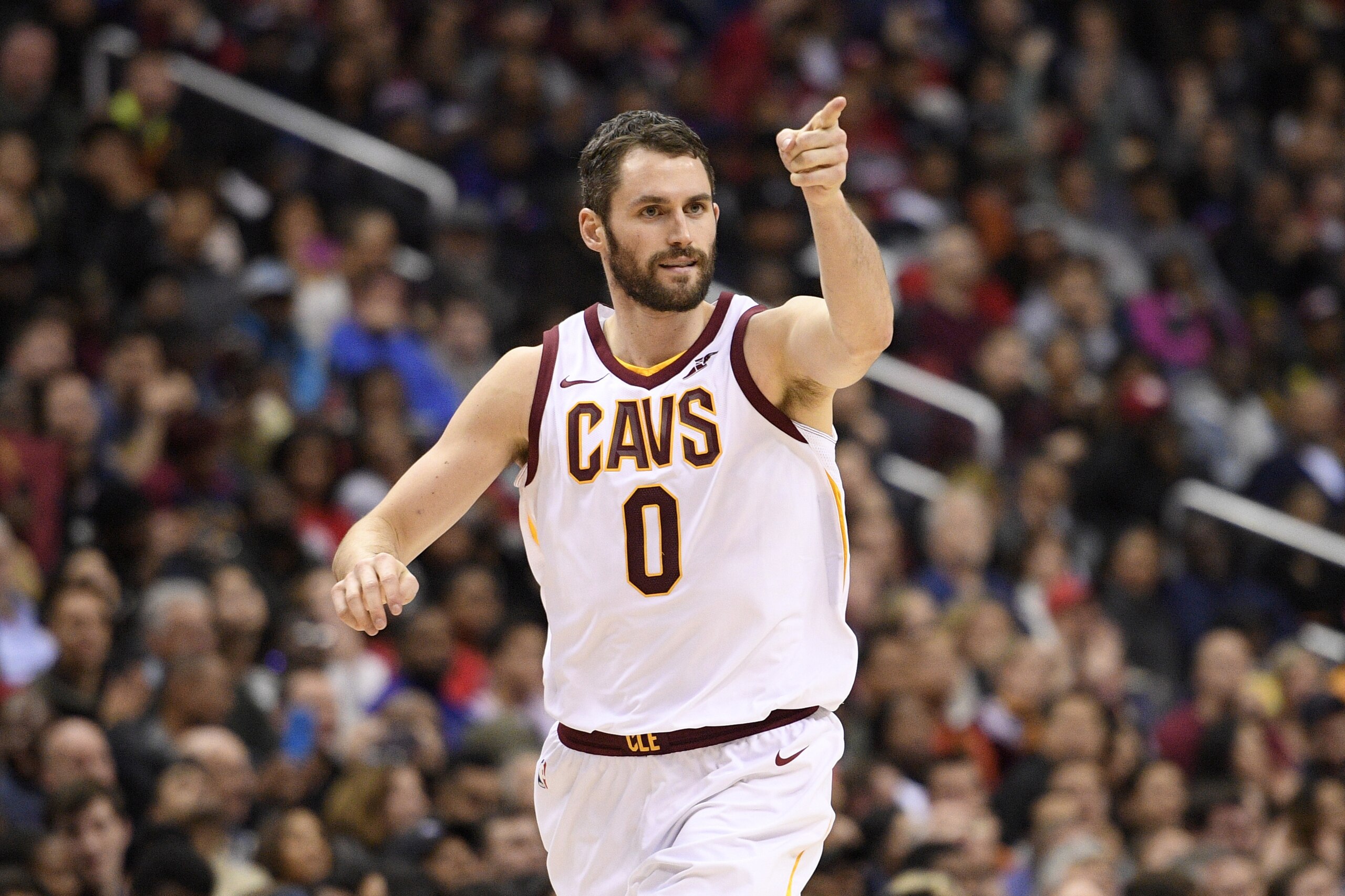 Cleveland Cavaliers forward Kevin Love (0) points after he scored during the second half of an NBA basketball game against the Washington Wizards, Sunday, Dec. 17, 2017, in Washington. The Cavaliers won 106-99. (AP Photo/Nick Wass)