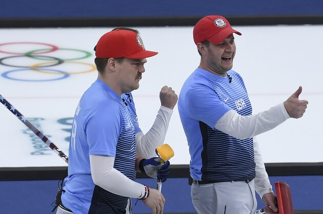 USA's John Shuster (R)celebrates after winning the curling men's semi-final game against Canada during the Pyeongchang 2018 Winter Olympic Games at the Gangneung Curling Centre in Gangneung on February 22, 2018. / AFP PHOTO / WANG Zhao        (Photo credit should read WANG ZHAO/AFP/Getty Images)