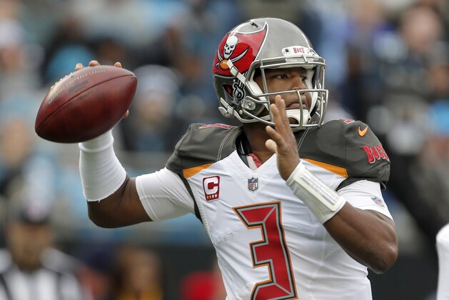 Tampa Bay Buccaneers' Jameis Winston (3) looks to pass against the Carolina Panthers during the first half of an NFL football game in Charlotte, N.C., Sunday, Dec. 24, 2017. (AP Photo/Bob Leverone)