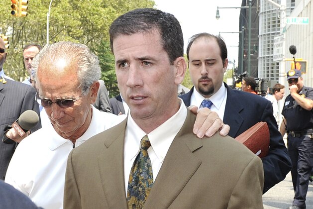 Former NBA referee Tim Donaghy exits Brooklyn federal court following his sentencing, Tuesday, July 29, 2008, in New York. Donaghy was sentenced to 15 months in prison Tuesday for setting off a gambling scandal that tarnished the league's reputation and raised questions about the integrity of its officiating. (AP Photo/ Louis Lanzano)