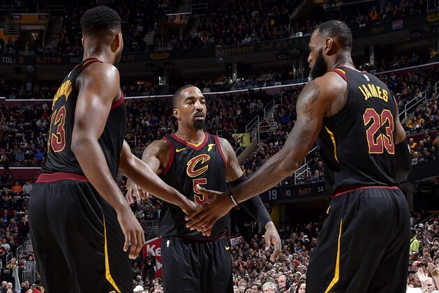 CLEVELAND, OH - FEBRUARY 22: Tristan Thompson #13 JR Smith #5 and LeBron James #23 of the Cleveland Cavaliers exchange high fives during the game against the Washington Wizards on February 22, 2018 at Quicken Loans Arena in Cleveland, Ohio. NOTE TO USER: User expressly acknowledges and agrees that, by downloading and/or using this Photograph, user is consenting to the terms and conditions of the Getty Images License Agreement. Mandatory Copyright Notice: Copyright 2018 NBAE (Photo by David Liam Kyle/NBAE via Getty Images)