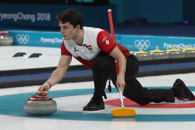 GANGNEUNG, SOUTH KOREA - FEBRUARY 23: Benoit Schwarz of Switzerland competes during the Bronze Medal match between Canada and Switzerland on day fourteen of the PyeongChang 2018 Winter Olympic Games at Gangneung Curling Centre on February 23, 2018 in Gangneung, South Korea.  (Photo by Robert Cianflone/Getty Images)