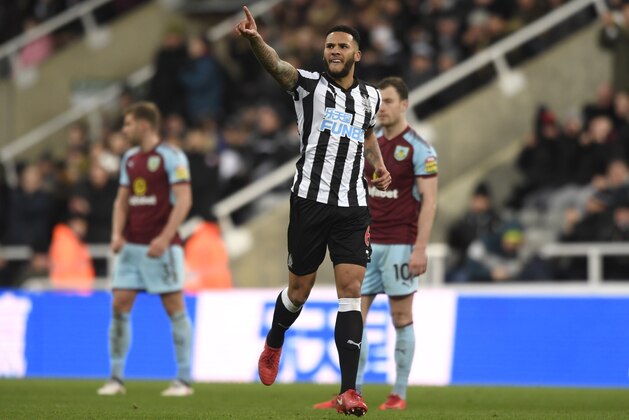 NEWCASTLE UPON TYNE, ENGLAND - JANUARY 31:  Jamaal Lascelles of Newcastle United celebrates after scoring his sides first goal   during the Premier League match between Newcastle United and Burnley at St. James Park on January 31, 2018 in Newcastle upon Tyne, England.  (Photo by Stu Forster/Getty Images)