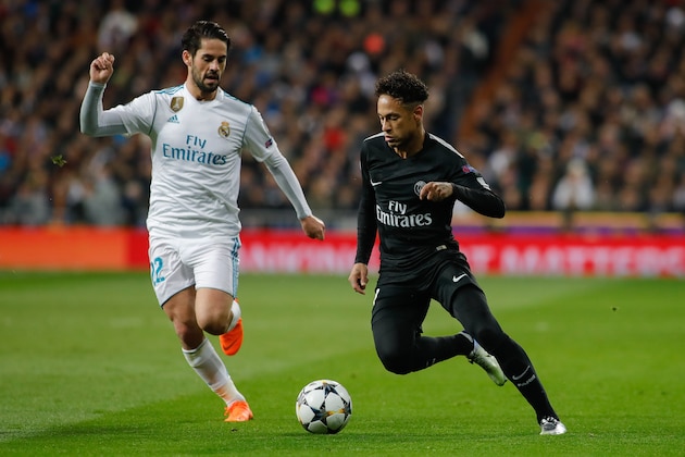 MADRID, SPAIN - FEBRUARY 14: Isco of Real Madrid and Neymar of Paris Saint-Germain battle for the ball during the UEFA Champions League Round of 16 First Leg match between Real Madrid and Paris Saint-Germain at Bernabeu on February 14, 2018 in Madrid, Spain. (Photo by TF-Images/ Getty Images)